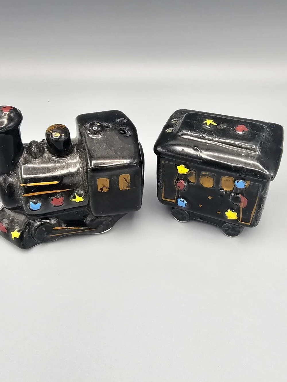 Vintage Black Ceramic Train Salt and Pepper Shakers with Colorful Star Accents